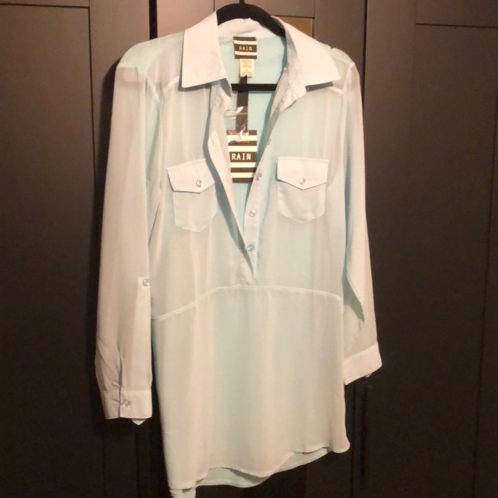 See-through light blue blouse